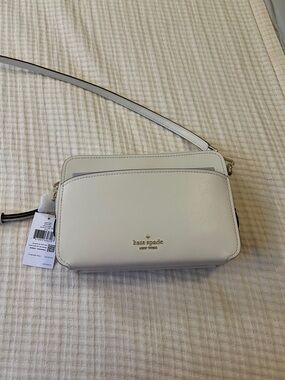 kate spade Lauryn Cream Leather Crossbody with Gold Logo